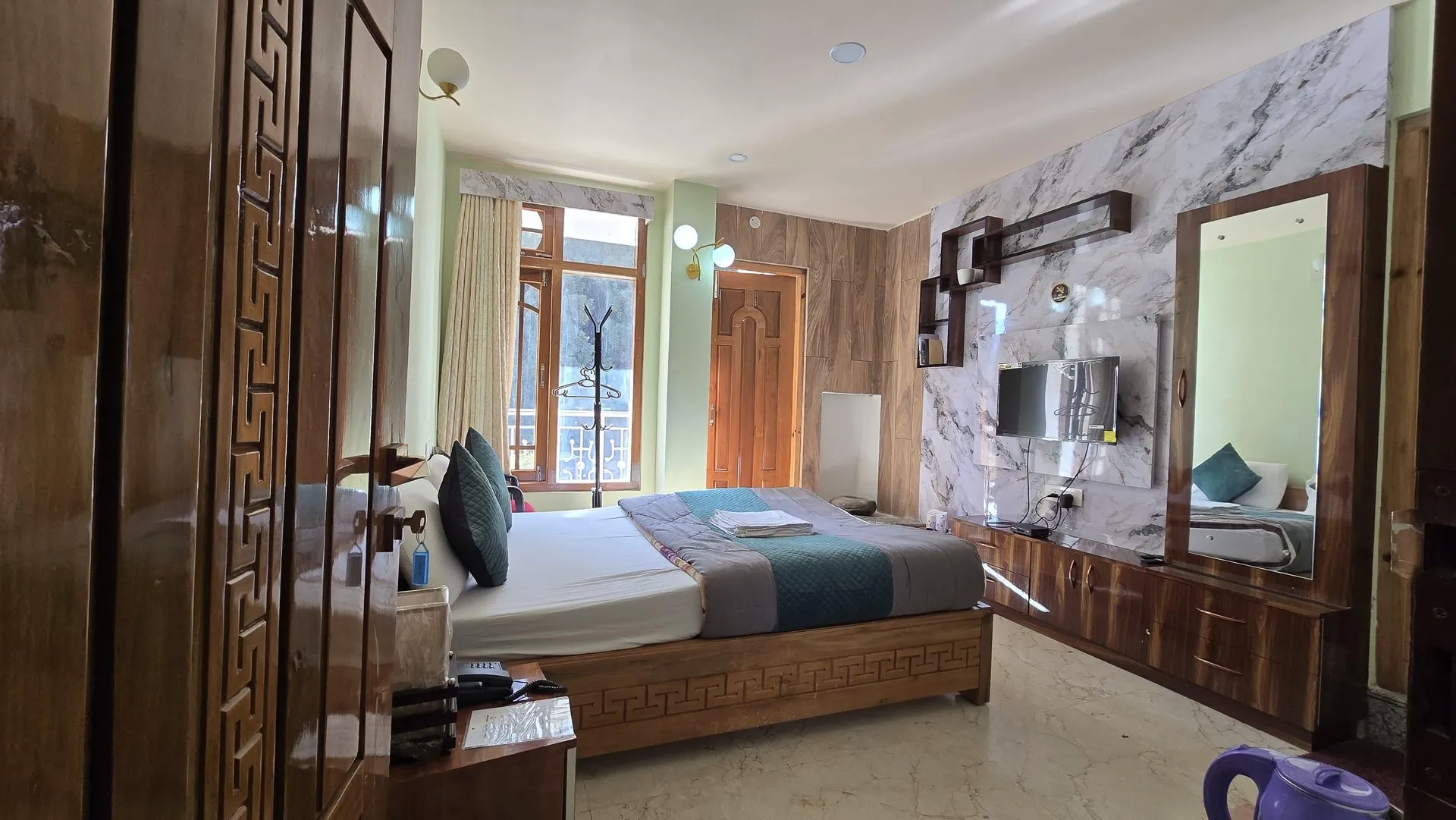 Wide interior view of the Deluxe Room
