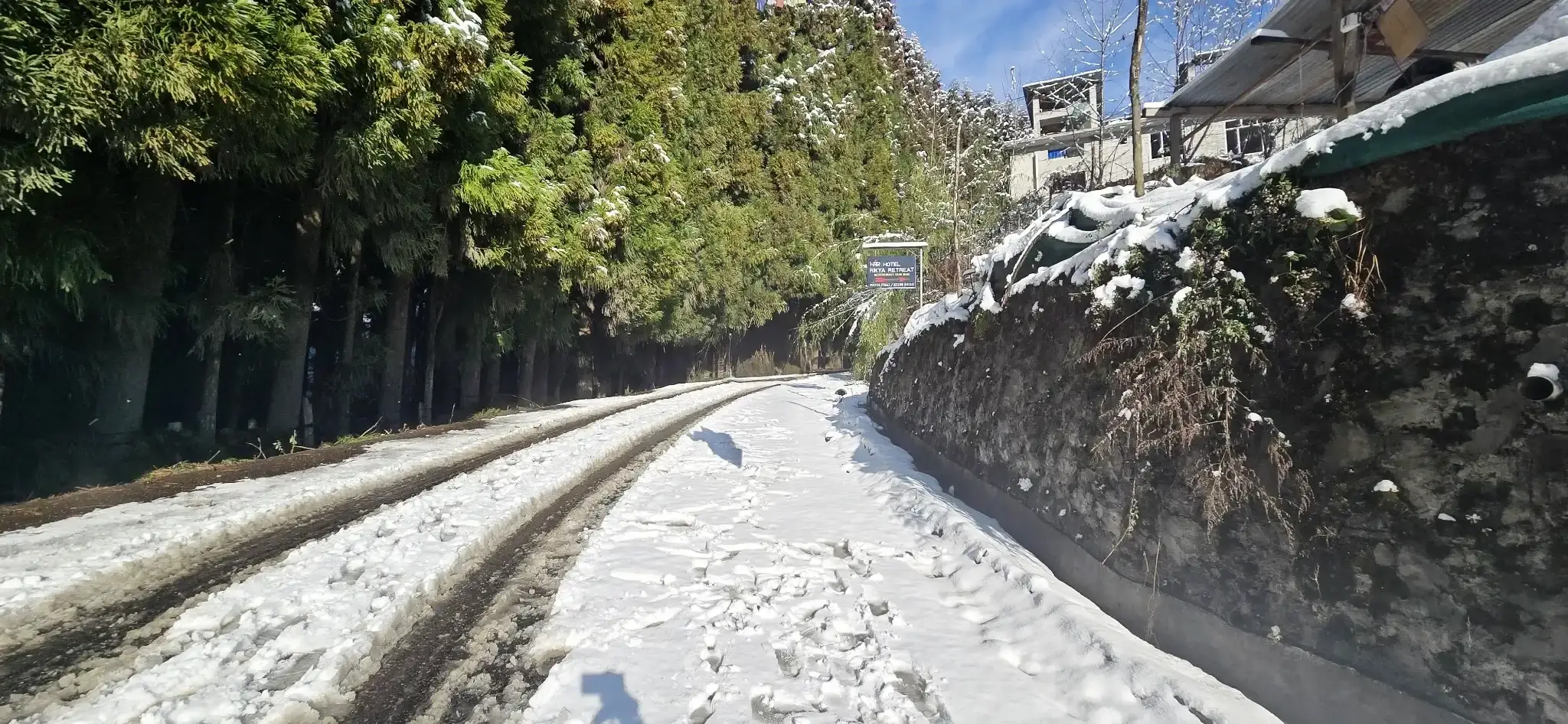 Snow covered road near Rikya Retreat Tawang